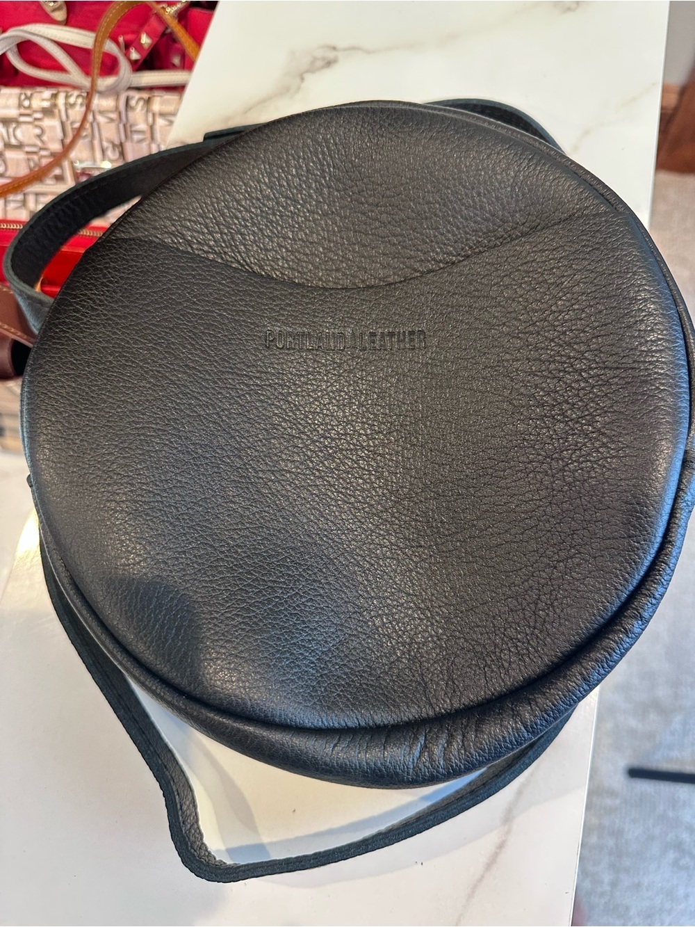 PORTLAND LEATHER GOODS Large 9"
Circle Crossbody Bag Black Pebbled
Leather